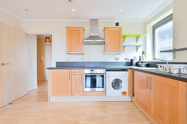 Photo 2 — 168 Trentham Court, Victoria Road, London