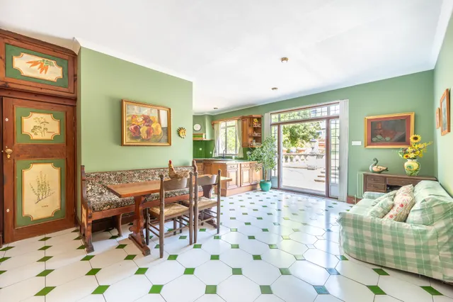 Photo 2 — 72 Donnington Road, London