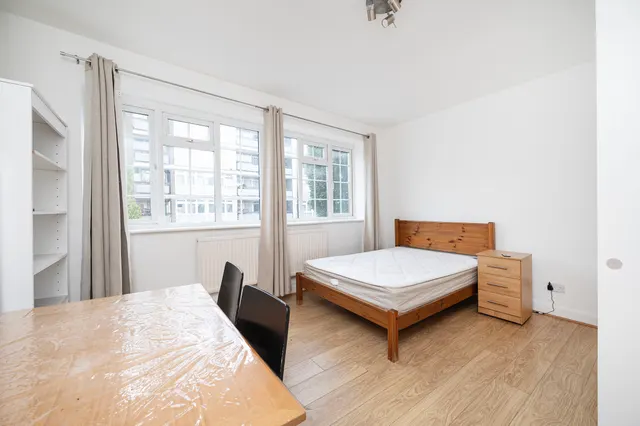 Photo 2 — 115a Cannon Street Road, London