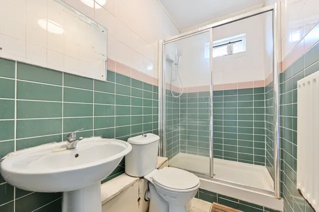 Photo 2 — 393 Durnsford Road, London