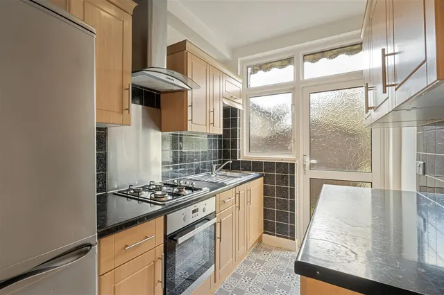 Photo 2 — Lower Downs Road, London SW20 8QG