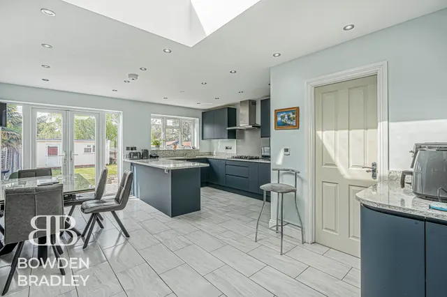 Photo 2 — Harewood Drive, Clayhall, IG5