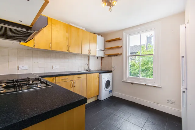 Photo 2 — 26b Cabul Road, London