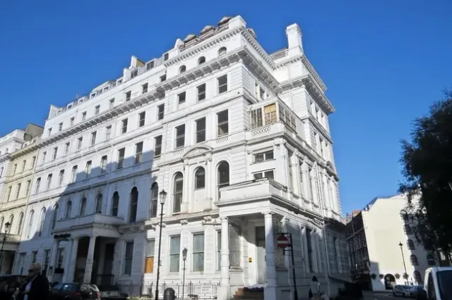 TWO STUCCO FRONTED FREEHOLD BUILDINGS...