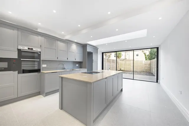 Photo 2 — Sandringham Avenue, London SW20 8JY