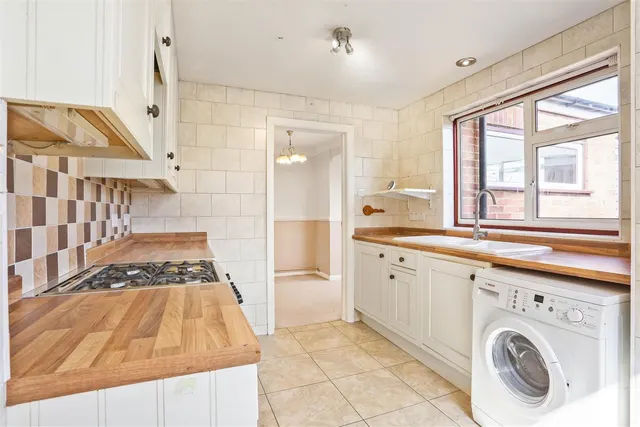 Photo 3 — Poplar Crescent, Epsom, KT19 9ER