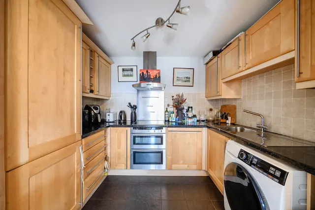 Photo 2 — 152 Brompton Park Crescent, London