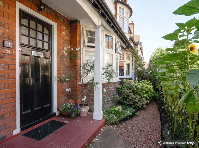 Photo 2 — Compton Road, London, SW19 7QD