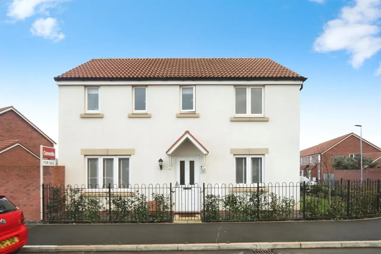 Detached white-render home exterior