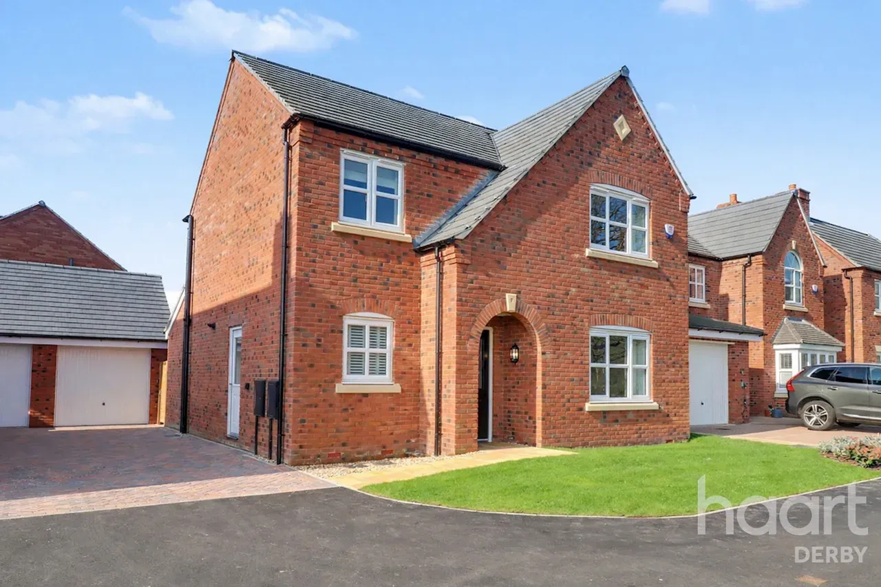 Detached red brick house