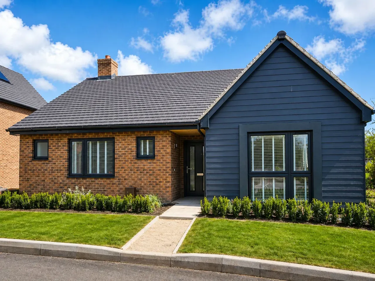 Single-storey dark-clad bungalow