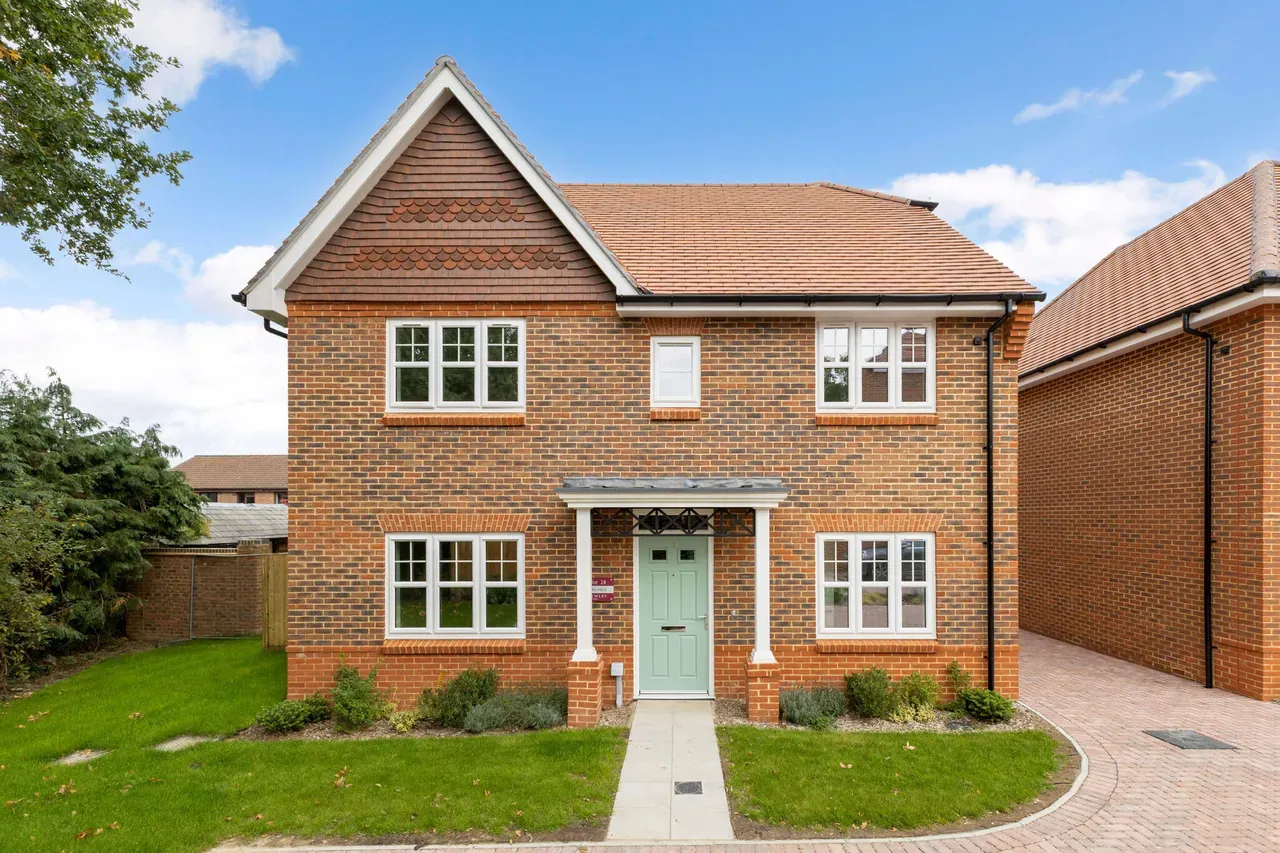 Detached home with green door
