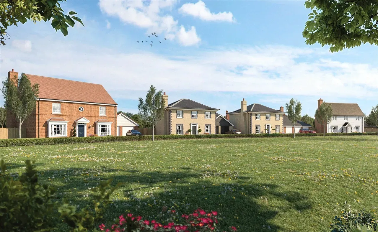 Homes across green lawn