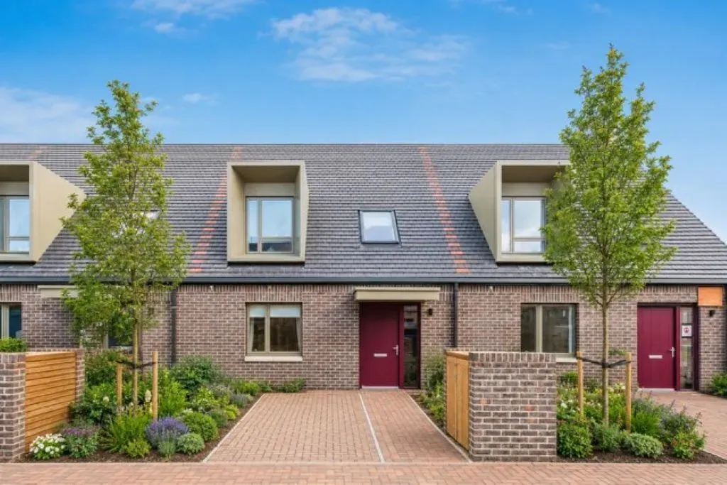 Brick terrace exterior with dormers