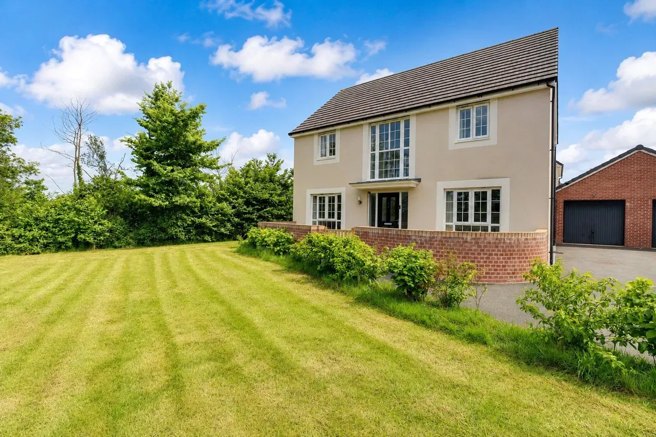 Detached house with lawn