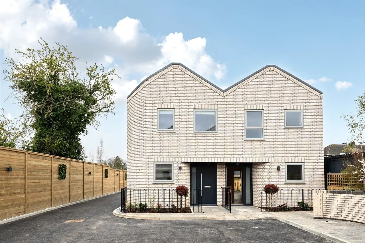 Pale brick homes front view