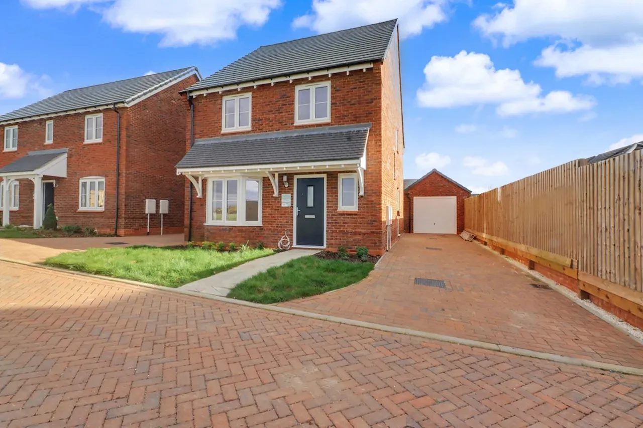 Brick home with drive