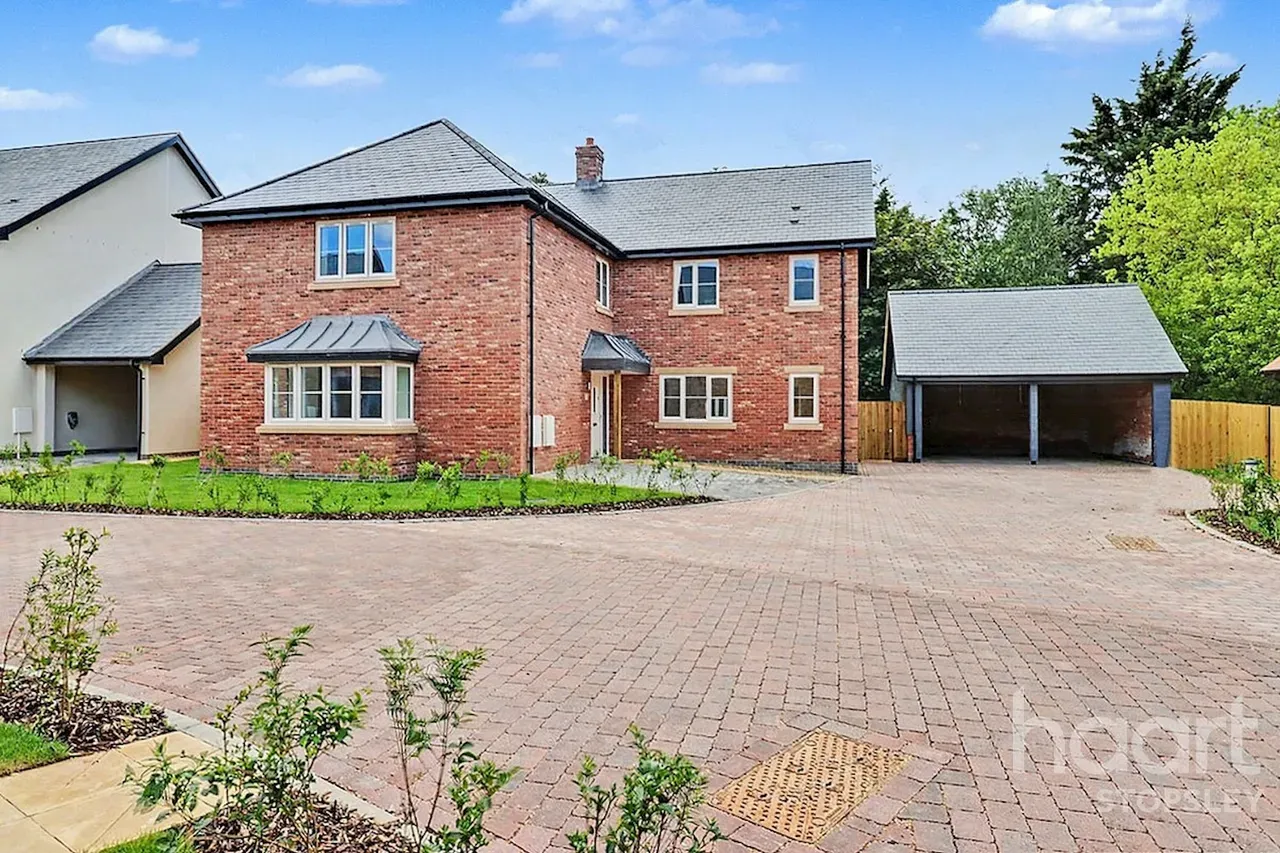 Detached brick house with carport
