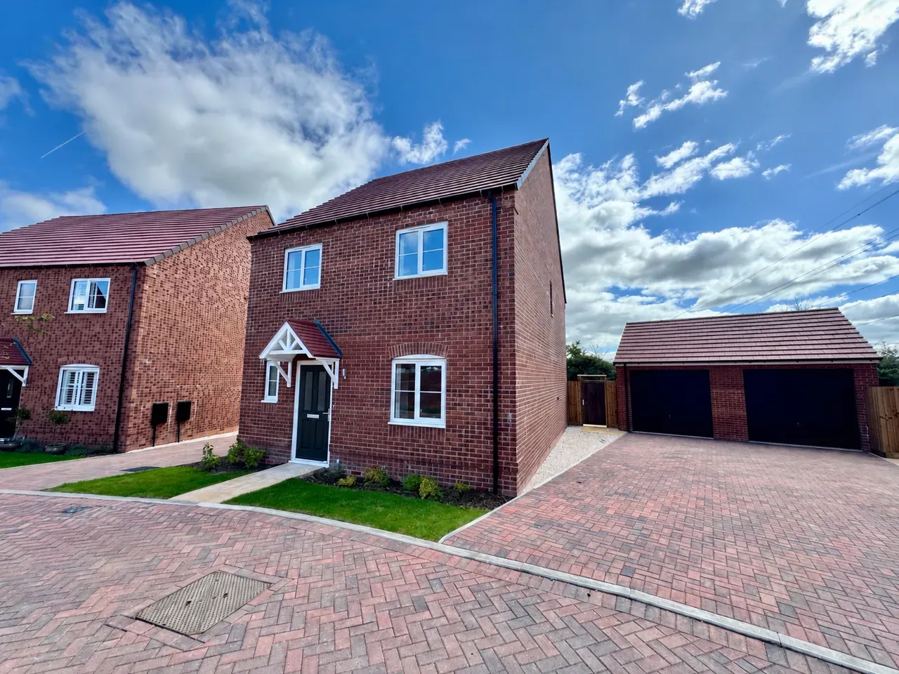 Detached brick home with garage