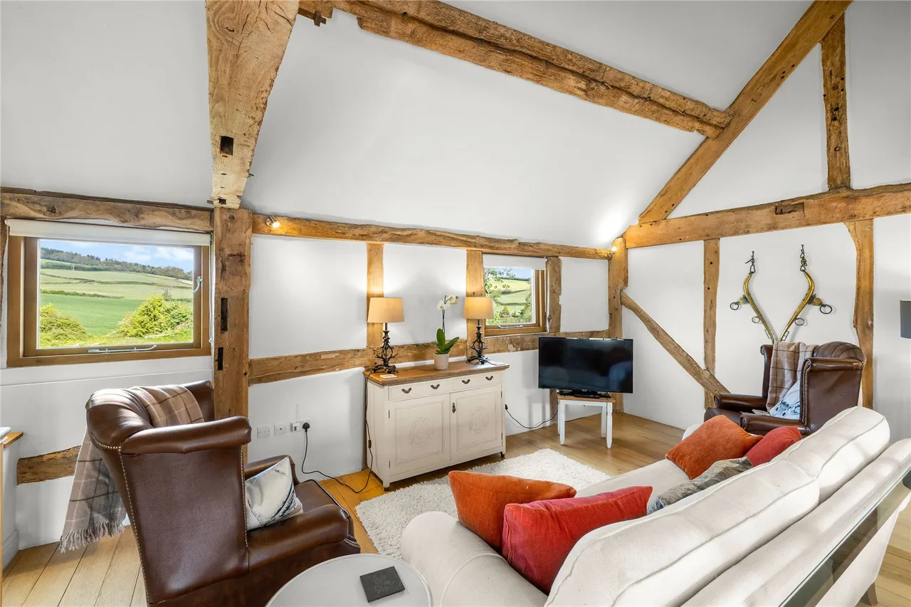 A semi-detached two bedroom bespoke barn conversion with character and charm in a quiet courtyard setting close to open, photo 6