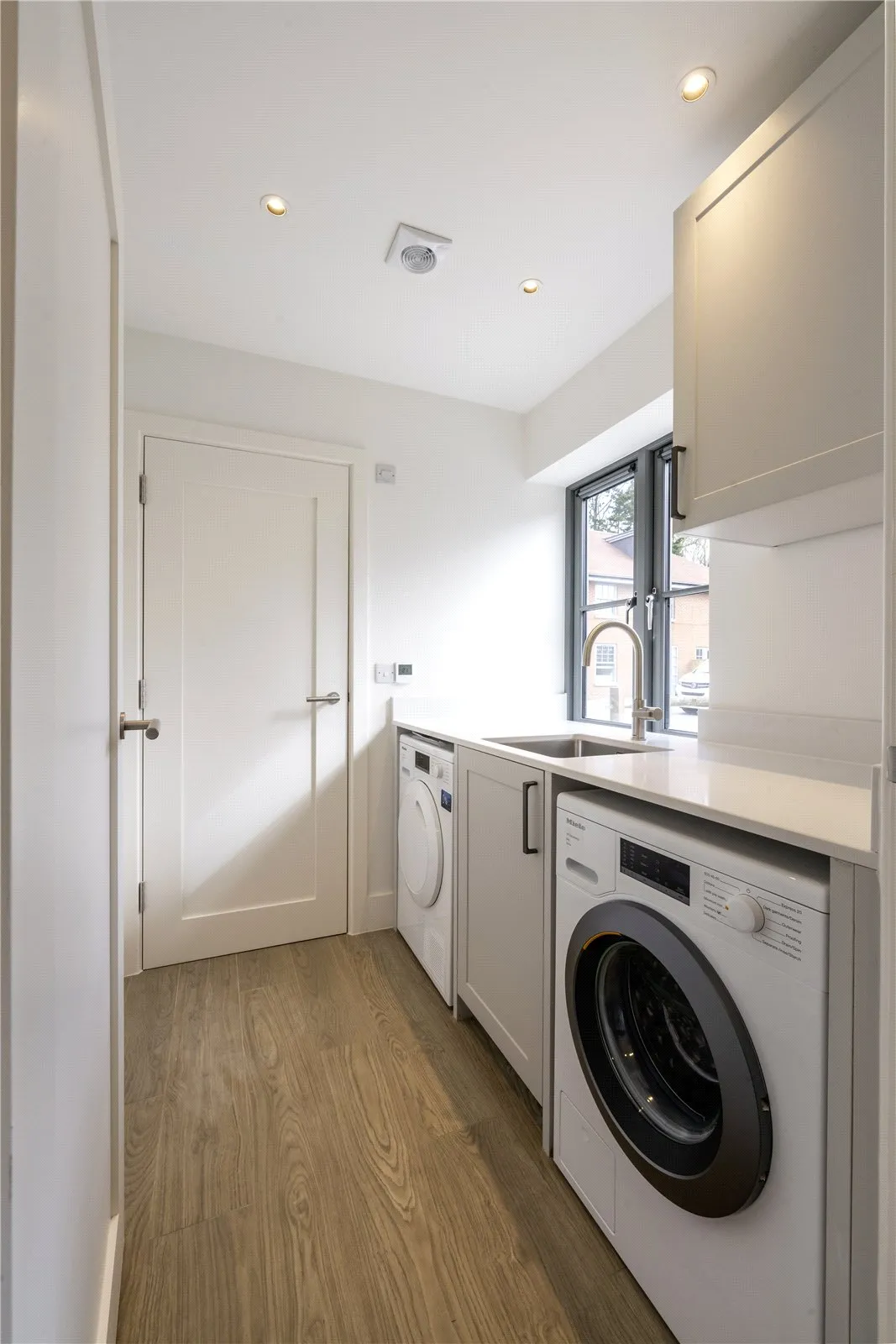 A beautifully proportioned new home with elegant finishes and a secluded west facing garden, photo 8