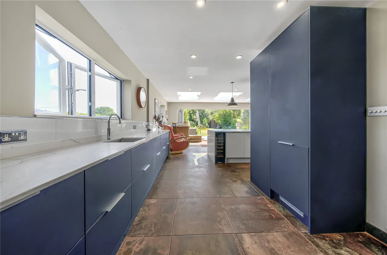 A beautifully extended family home with a spectacular kitchen and family room, private garden and countryside views, photo 10