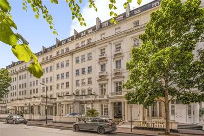 A bright two-bedroom duplex with a private patio garden, moments from Hyde Park